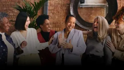 Women entrepreneurs in a supportive group coaching environment